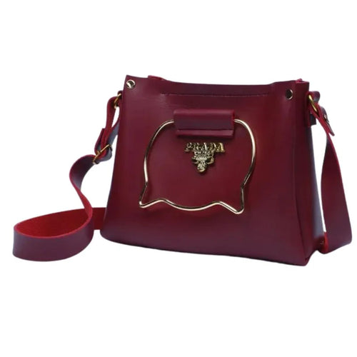 Maroon Elegant Cat Handle Handbag with Gold Accents